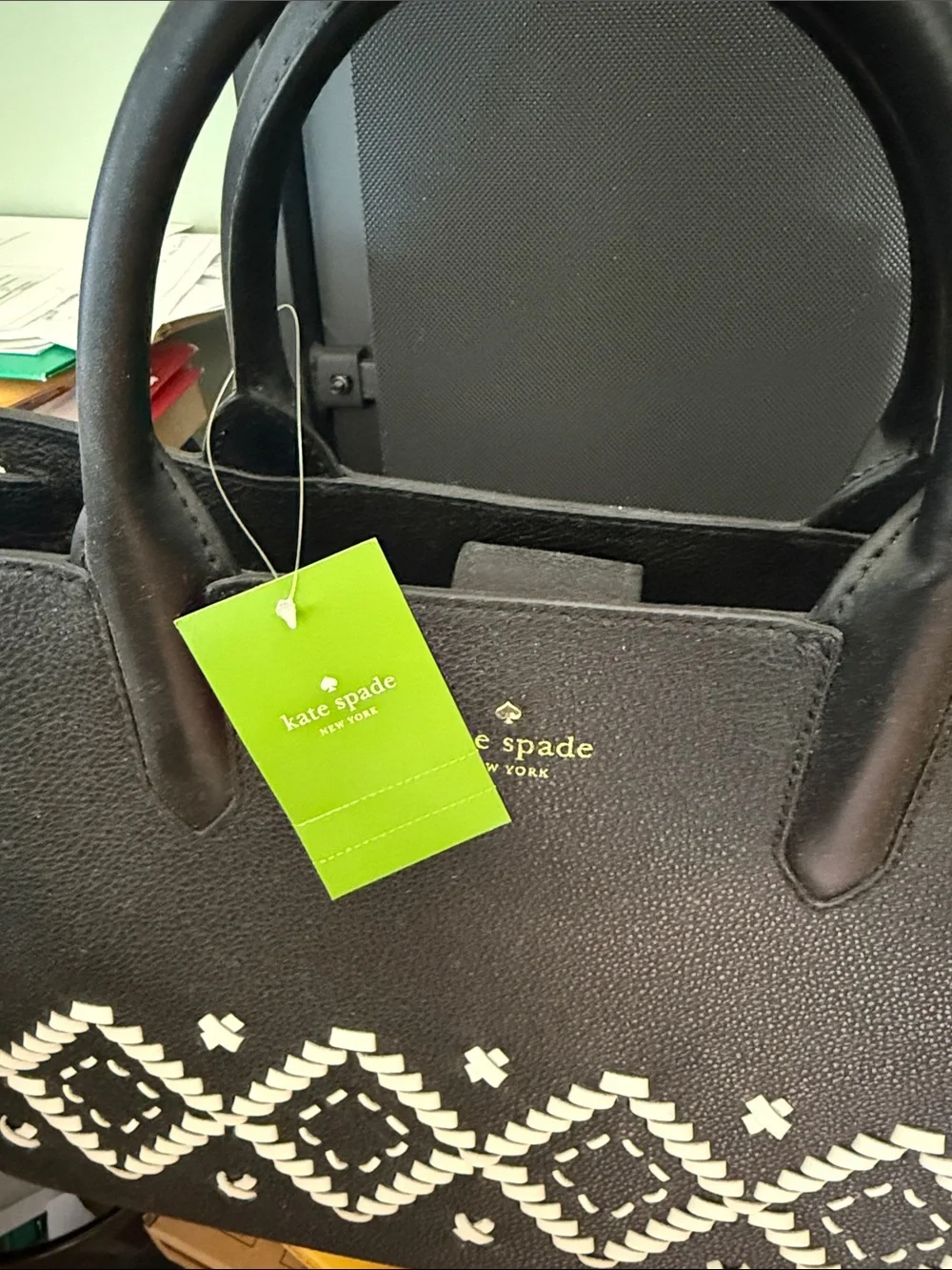 kate spade black satchel with white woven pattern
